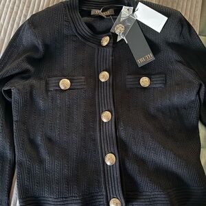 Truth Black Knitwear with Gold Accents